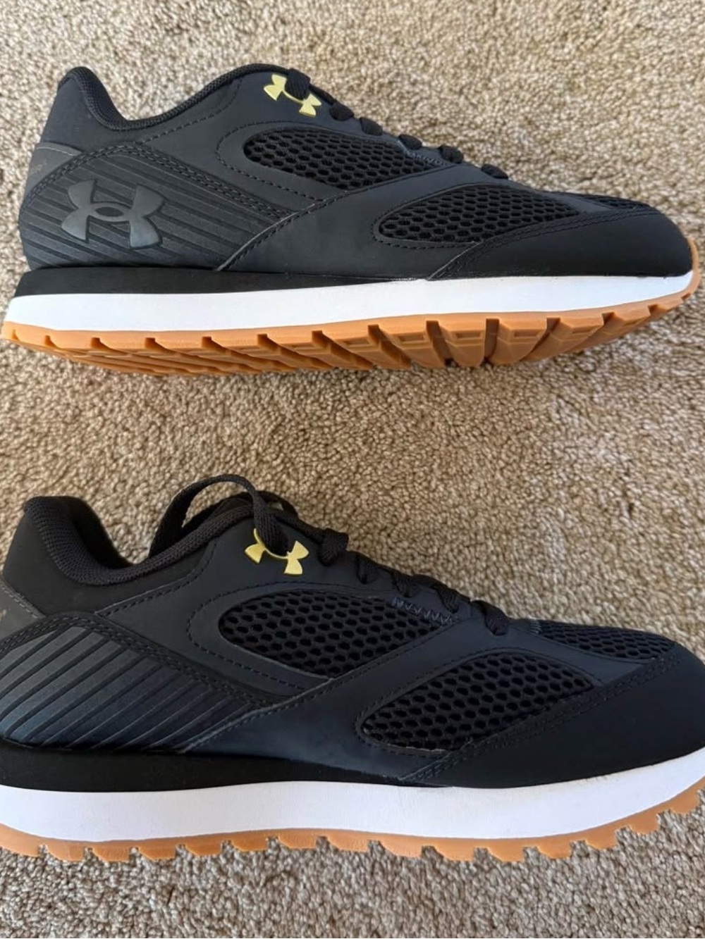 Under Armour Black Sneakers with Gold Accent